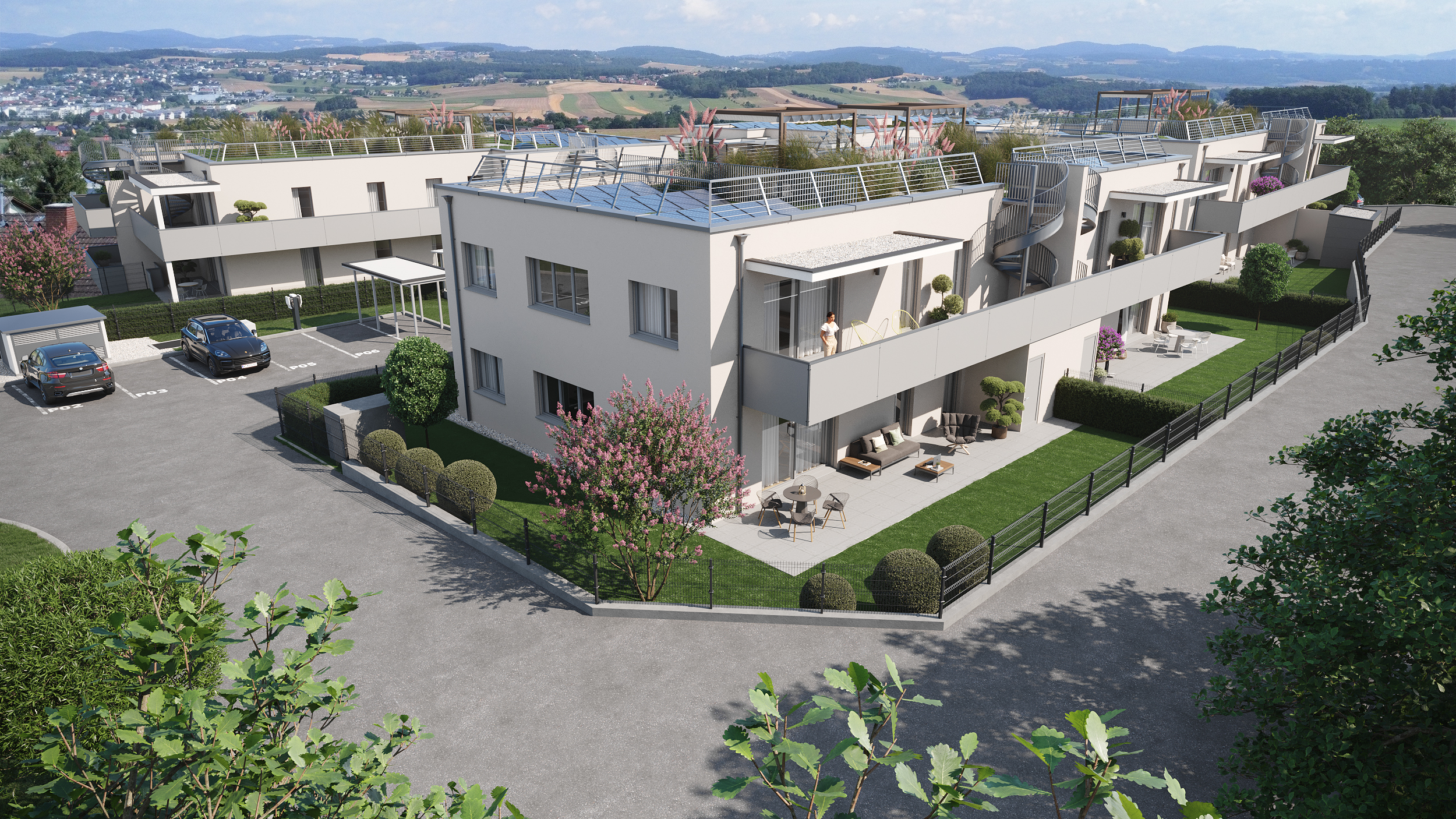Anlage mit Balkonen und Dachterrassen